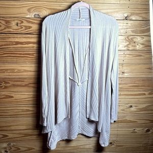 Size medium light rose color knit cross back long sleeve cardigan Maurice’s